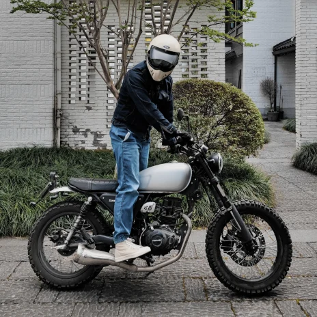 Blucap founder on a motorcycle